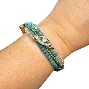 The Buckle teal, crystal, and brown beaded wrap bracelet